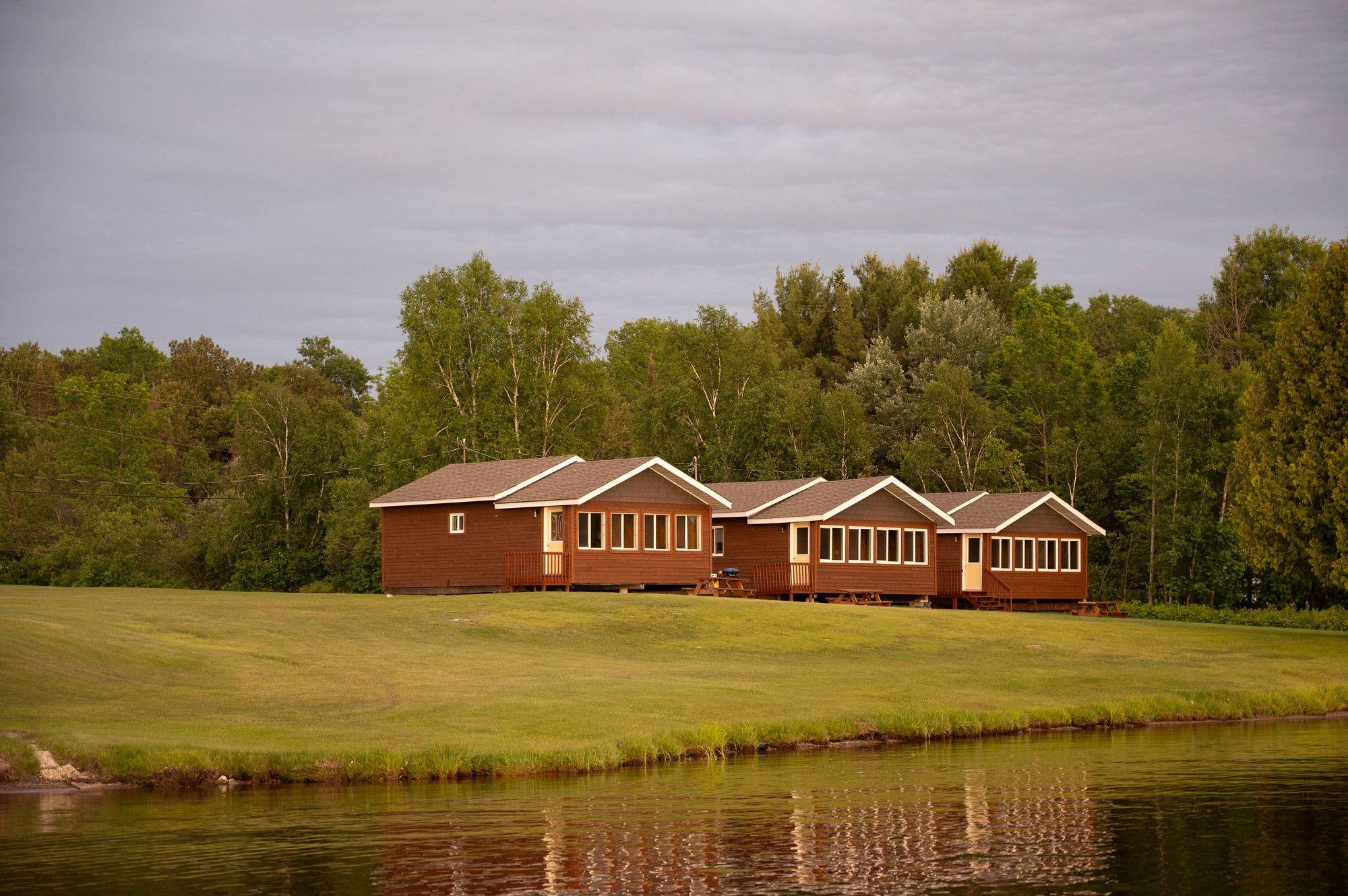 Cottages on the lawn overlooking Tomiko Lake
